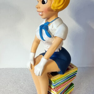 Natacha assise sur une pile de livres - 22 cm  éditions COLLECTOYS / DUPUIS 2023 neuve